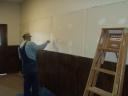 Jack mudding in the sheetrock during the foyer remodeling
