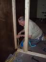 Bob puts in an electrical plug in the new Quiet Room.